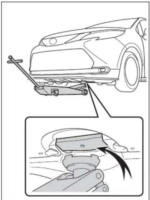 Technical diagram showing car suspension system with mechanical components and safety instructions