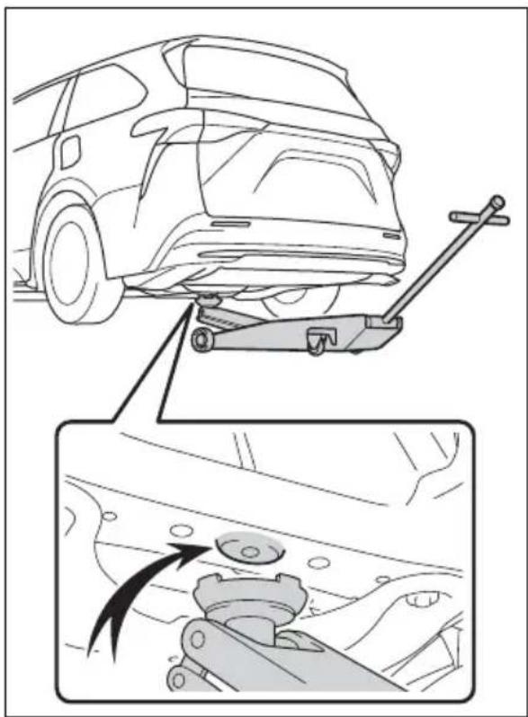 Diagram illustrating car suspension system with mechanical components and directional arrow indicating motion