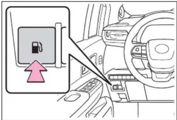 Diagram showing car interior with a fuel pump icon and directional arrow, indicating fuel movement or safety warning.