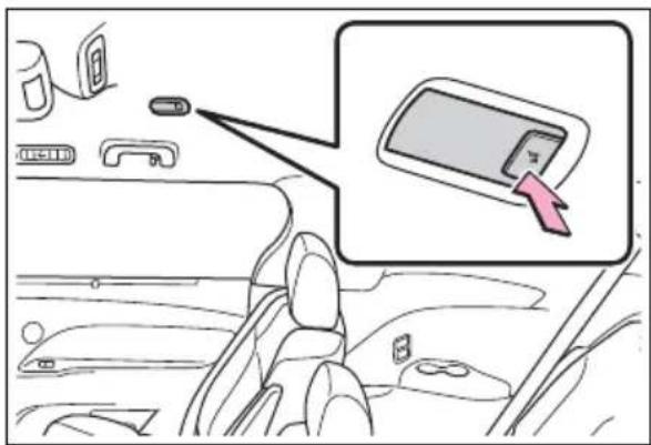 Diagram showing car interior with a close-up of a device labeled '手机' (smartphone) and a magnified view highlighting the device's insertion.