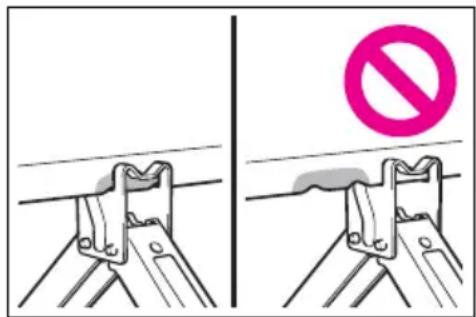 Diagram showing two safety instructions: one with a no-smoking symbol above a metal bracket, the other with a crossed-out cable.