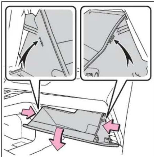 Diagram illustrating car interior components with arrows indicating movement, showing structural changes and directional arrows.
