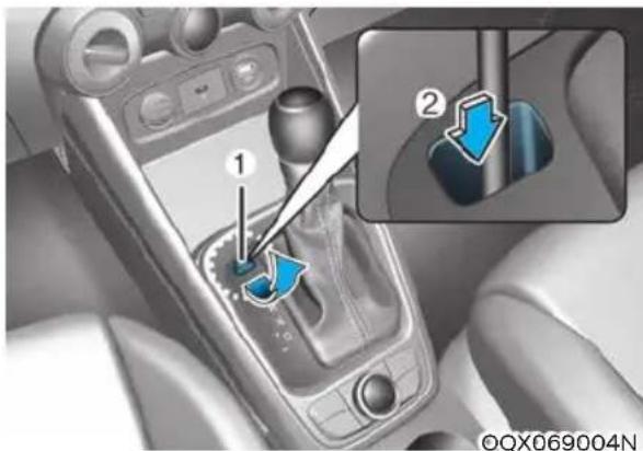 Diagram showing car gear shift mechanism with labeled parts and blue directional arrows indicating motion