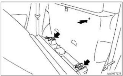 Diagram showing vehicle seatbelt mechanism with directional arrows and component labels