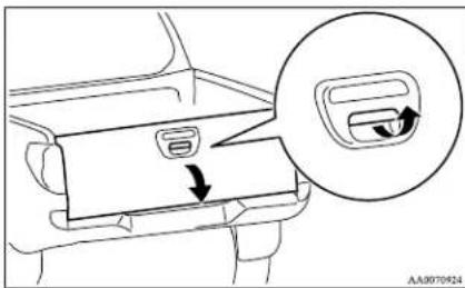 Diagram showing car seatbelt switch with directional arrow and magnified view of the handle