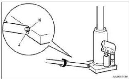 Technical diagram showing a mechanical assembly with labeled parts J, K, and a magnified inset view of a component.