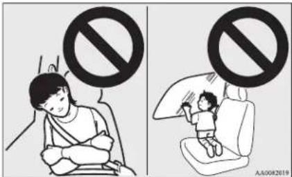 Two-panel cartoon showing a child in a car seat and another with a 'no' symbol above, likely indicating no restrictions or absence.
