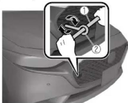 Diagram showing a hand holding a wrench and wrench with numbered annotations, likely illustrating a mechanical or electrical component.