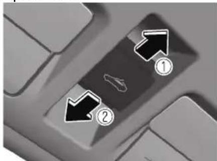 Close-up of a keyboard key with numbered arrows indicating directional movement or function, highlighting two key points labeled ① and ②.