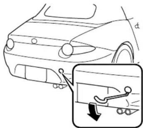 Diagram showing car side profile with angle α and a magnified inset highlighting the steering wheel mechanism.