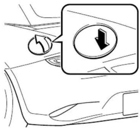 Diagram showing car interior with directional arrow and circular icon, likely indicating vehicle or traffic flow