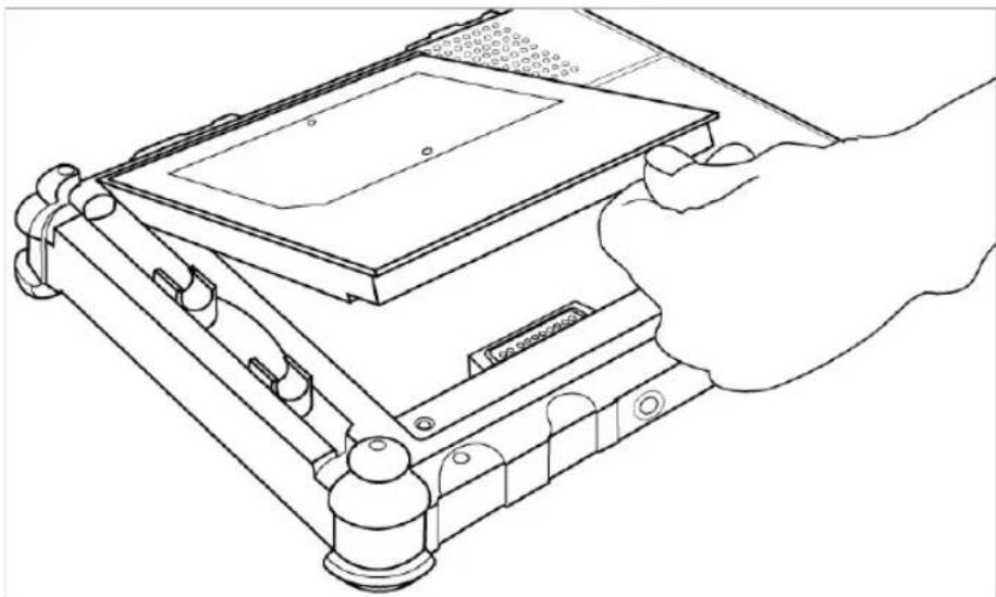 Line drawing of a hand holding a computer monitor with a tray, showing mechanical components and ports (no text or symbols)