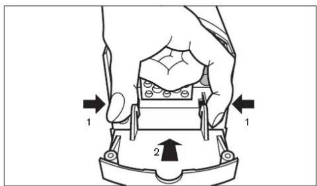 Diagram showing a hand holding a device with labeled parts and directional arrows indicating movement or force.