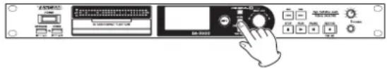 Diagram of a device control panel with labeled ports and a hand interacting with the screen