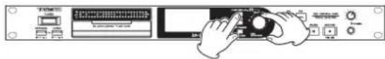 Diagram showing hands operating a device with labeled ports and control buttons, likely from an electronic device interface.