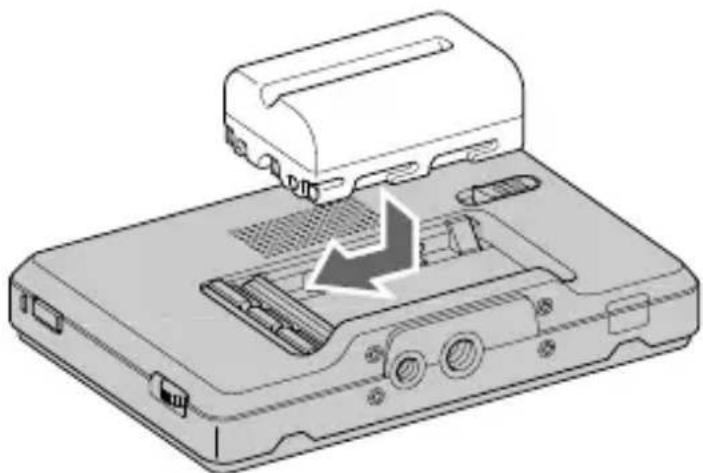 SONY CLM-V55 - Presione ligeramente la batería en el sentido mostrado, y después deslícela hacia la izquierda mientras la mantenga todavía presionada. - 1