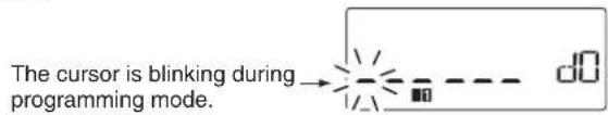 The cursor is blinking during programming mode.