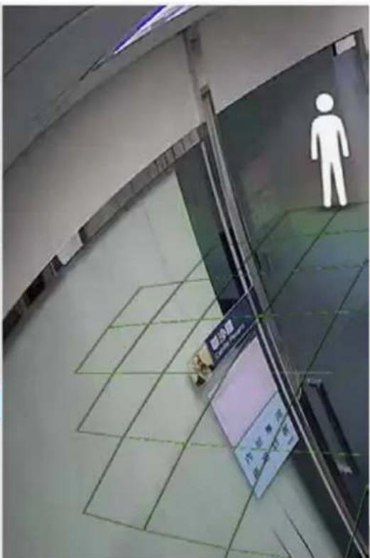 Street photo showing a building entrance with a white human figure and a signboard with Chinese characters, indicating a parking or security feature.