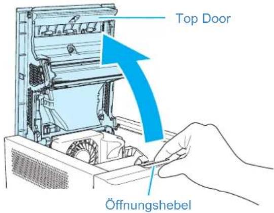 DNP DP-QW410 - Ziehen Sie den Öffnungshebel in Ihre Richtung, um die Top Door des Druckers zu öffnen. Entfernen Sie das Farbband. - 1