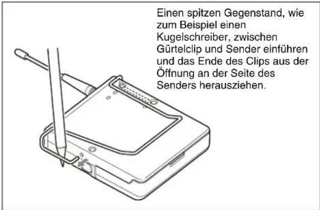Einen spitzen Gegenstand, wie zum Beispiel einen Kugelschreiber, zwischen Gürtelclip und Sender einführen und das Ende des Clips aus der Öffnung an der Seite des Senders herausziehen.