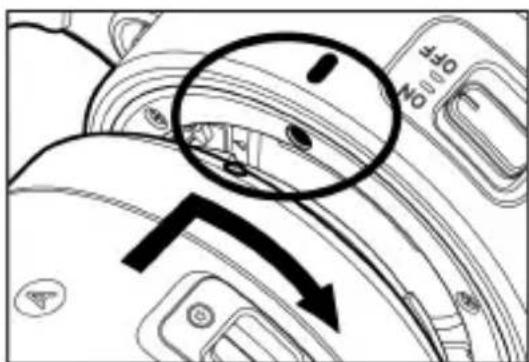 Technical diagram showing mechanical component with labeled parts and directional arrows indicating movement or flow