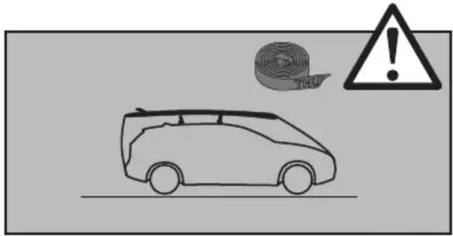 Diagram showing a car with a tape roll and warning symbol, likely indicating hazard or accident risk.