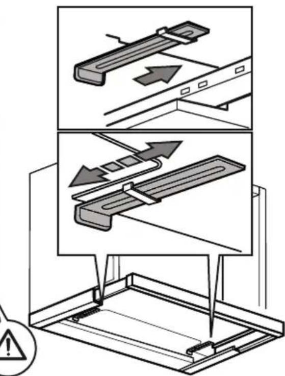 Technical diagram illustrating a mechanical assembly with directional arrows and warning symbol