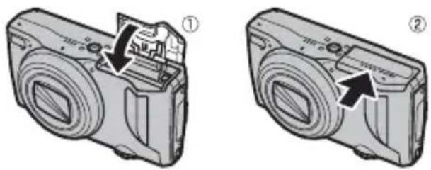 Diagram showing two views of a digital camera with labeled parts and directional arrows indicating assembly or repair.