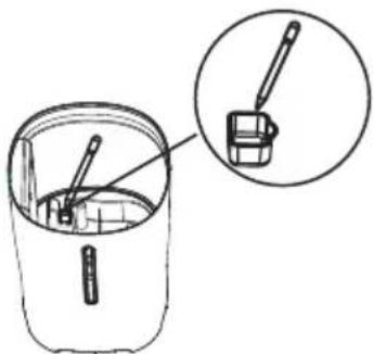 Diagram showing a container with internal components and a magnified inset of a container with a brush, likely illustrating a mechanical or electrical assembly.