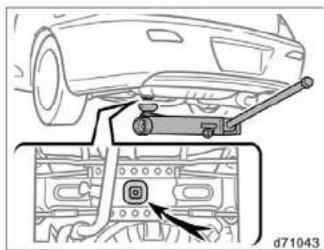Technical diagram showing car front suspension system with labeled component and inset view of control panel