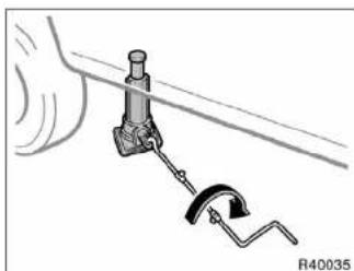 TOYOTA Tundra (2004) - Position the jack at the correct jack point as shown. - 3