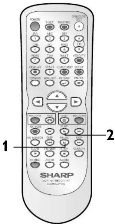 POWER T-SET THUR HNOG. OPEN/CLOSE ELECT JP/C ABC DEF CH 1 2 3 4 JPG MND 6 7 PQRS TUV WXYZ VIDEO/TV 8 9 DISPLAY SPACE CIAI/CRESET SETLIP 0 TOP MENU MENU/UNIT RETURN ENTER REC/OTR VCR DVD REC/DTN REC MODE PLAY REC MONITOR SKIP PAUSE SKIP SLOW CM SRAP STOP SEARCH- DUBENC ZOOM ALUDIO 1 2 SHARP VOC/RVD RECORDER COORINATION