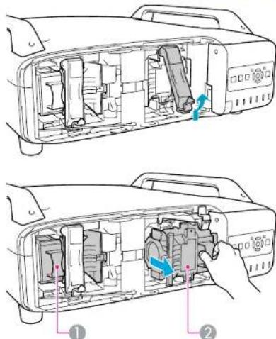 Technical diagram showing internal components of a printer or printer with labeled parts and directional arrows indicating movement or assembly.