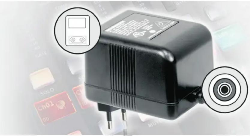 Product photo of a black industrial power supply unit with labeled buttons and display screen, showing two circular annotations pointing to the buttons.