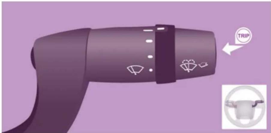Product diagram of a hair dryer with labeled buttons and icons, including a 'TRIP' button and a circular icon.