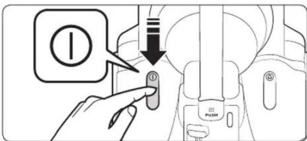 Diagram showing a hand pressing a button on a vehicle's side panel, with a speech bubble and downward arrow indicating action.