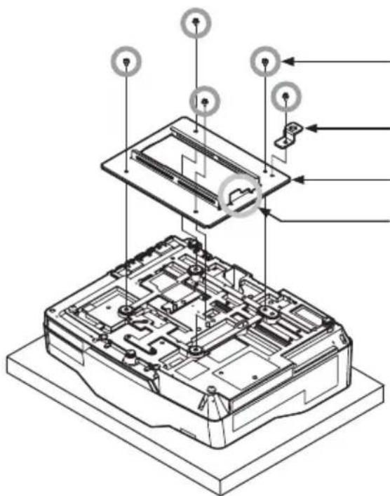 Technical diagram of an electronic device with labeled components and directional arrows indicating assembly or installation.