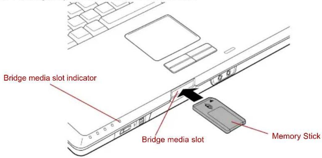 TOSHIBA Qosmio F20 - Inserting a Memory Stick - 1