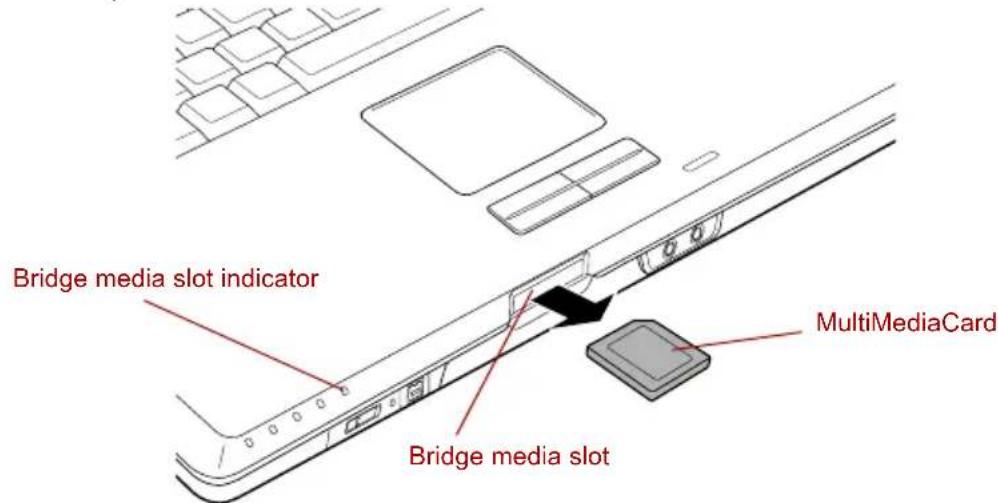 TOSHIBA Qosmio F20 - Removing a MultiMediaCard - 1