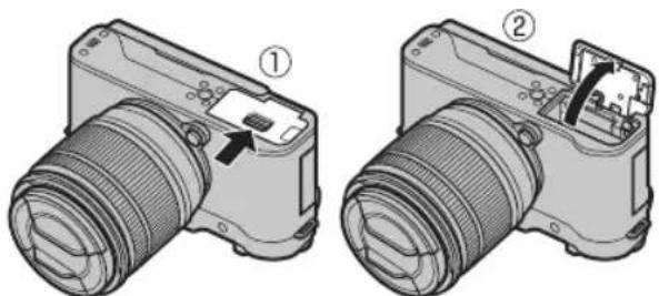 FUJIFILM X-A20 - Open the battery-chamber cover. - 1