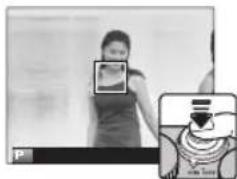Street photo with visible store signboards and a person's face detection interface