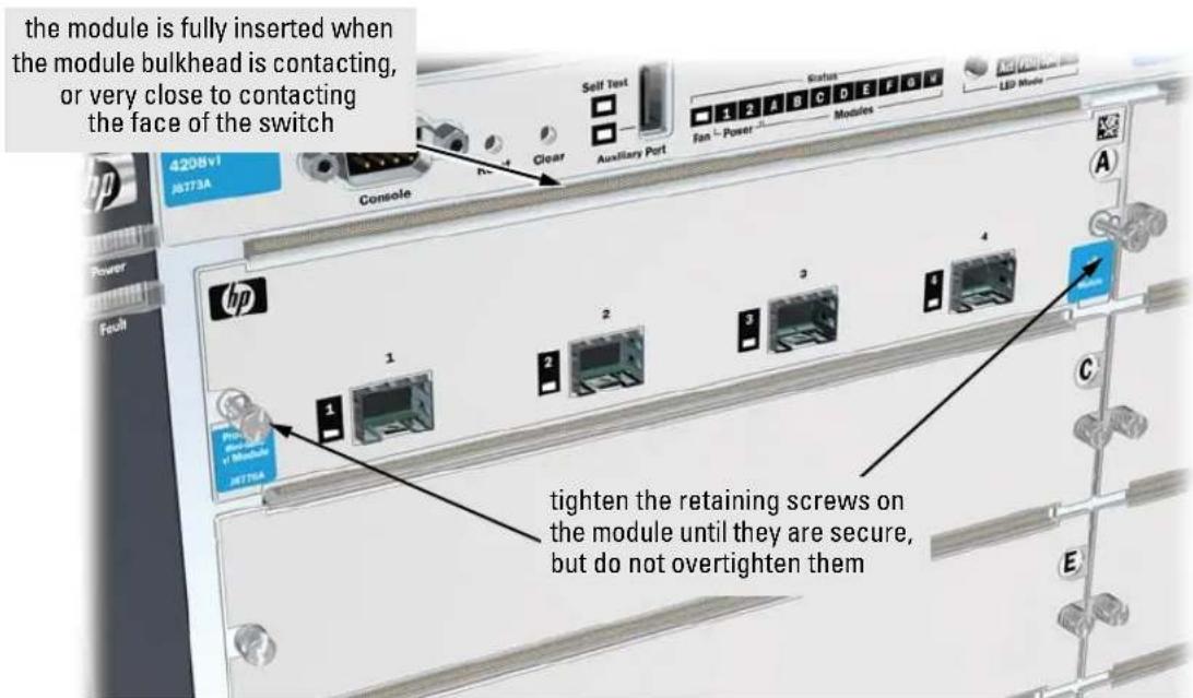 the module is fully inserted when the module bulkhead is contacting, or very close to contacting the face of the switch 4208v1 J8773A Console Clear Auxiliary Port Status 1 2 A C D E F G Fias Power Modules LED Mode HP Power Fault 1 2 3 4 from module of Module J8773A tighten the retaining screws on the module until they are secure, but do not overtighten them