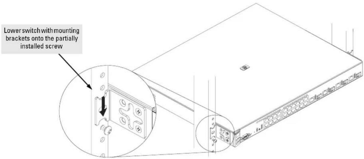 Lower switch with mounting brackets onto the partially installed screw