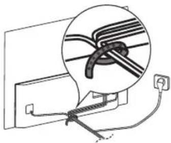 Diagram showing a cable being inserted into a socket, with an inset magnified view of the cable being inserted (no text or symbols present)