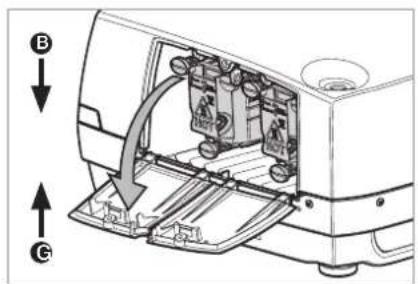 Technical diagram of an electronic device with labeled components and directional arrows indicating assembly or movement.