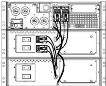 Technical diagram of an electronic device rack with labeled ports, switches, and wiring connections