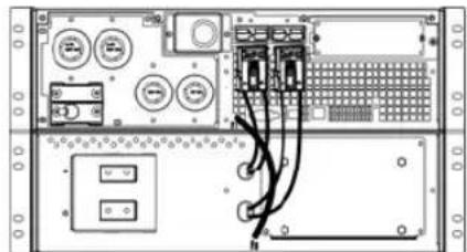 Diagram of an electronic device rear panel with labeled ports, switches, and wiring connections