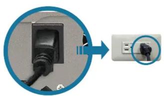 Close-up of a black electrical plug inserted into a socket, with a magnified inset showing the plug detail (no text or symbols visible)