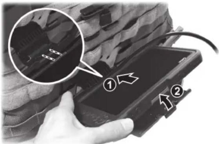Instructional image showing a hand holding a device with labeled parts, including numbered annotations ① and ②.