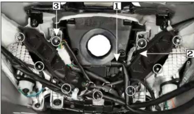 Labeled mechanical assembly diagram showing components numbered 1, 2, and 3 with visible wiring and connectors